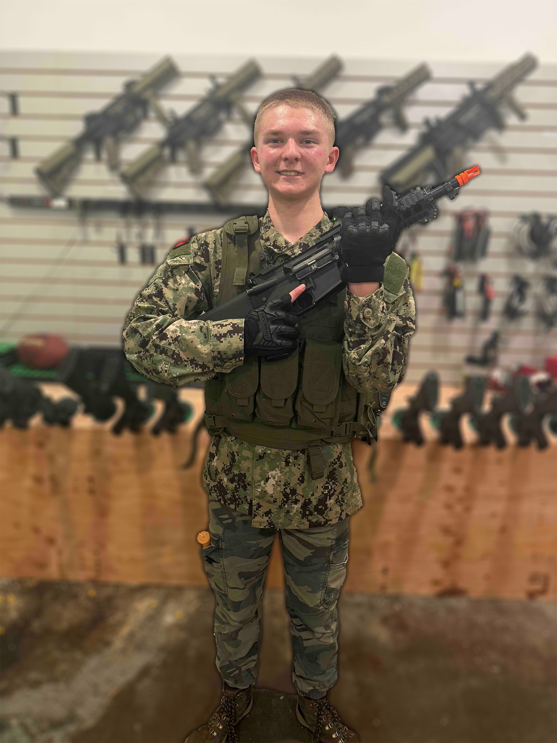 An airsoft player getting ready for a game.